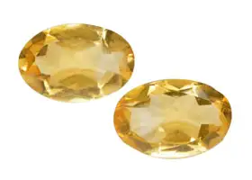 Pair of 6 mm x 4 mm oval cut citrines